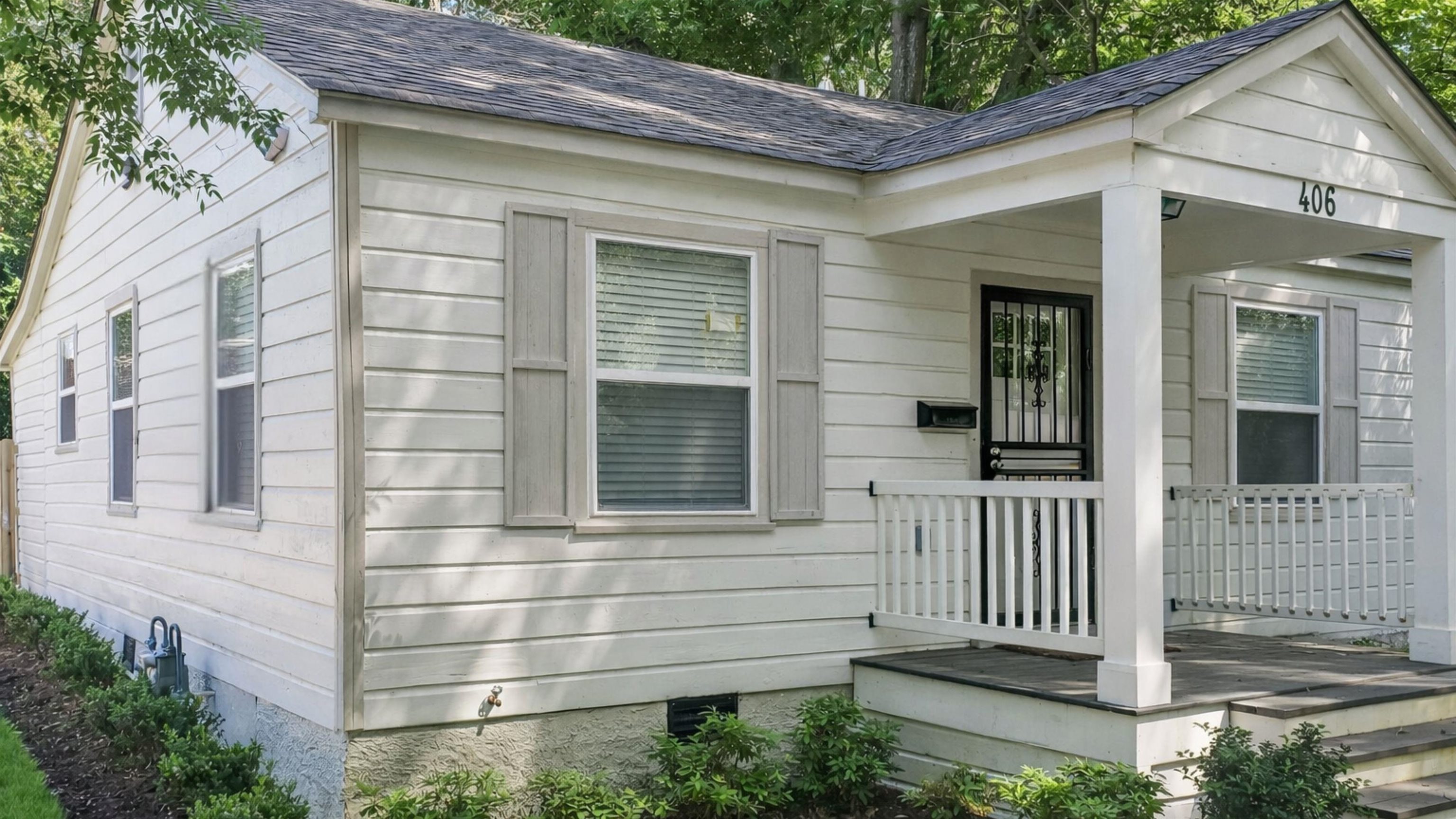 406 South Fenwick Road Memphis, TN 38111 - Photo 2 of 23 a view of a house with a small yard and wooden floor and fence