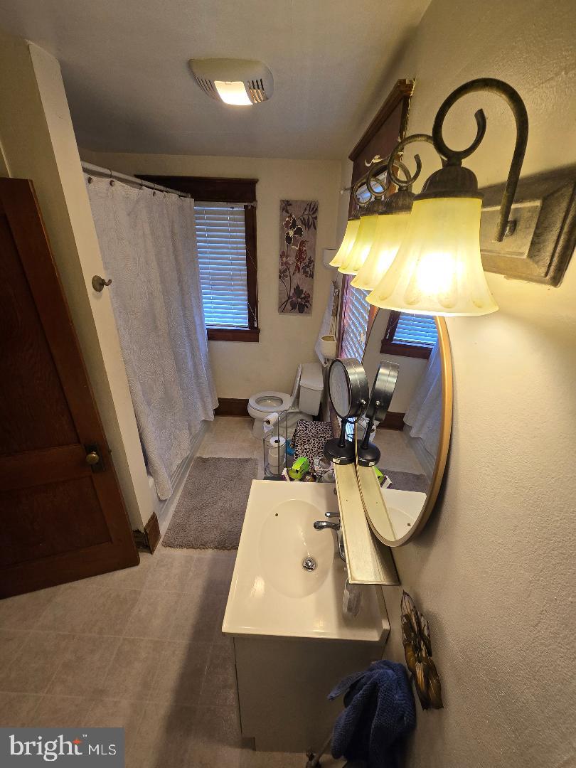 201 South Barbara Street Mount Joy, PA 17552 - Photo 11 of 13 a view of living room with a sink and chandelier