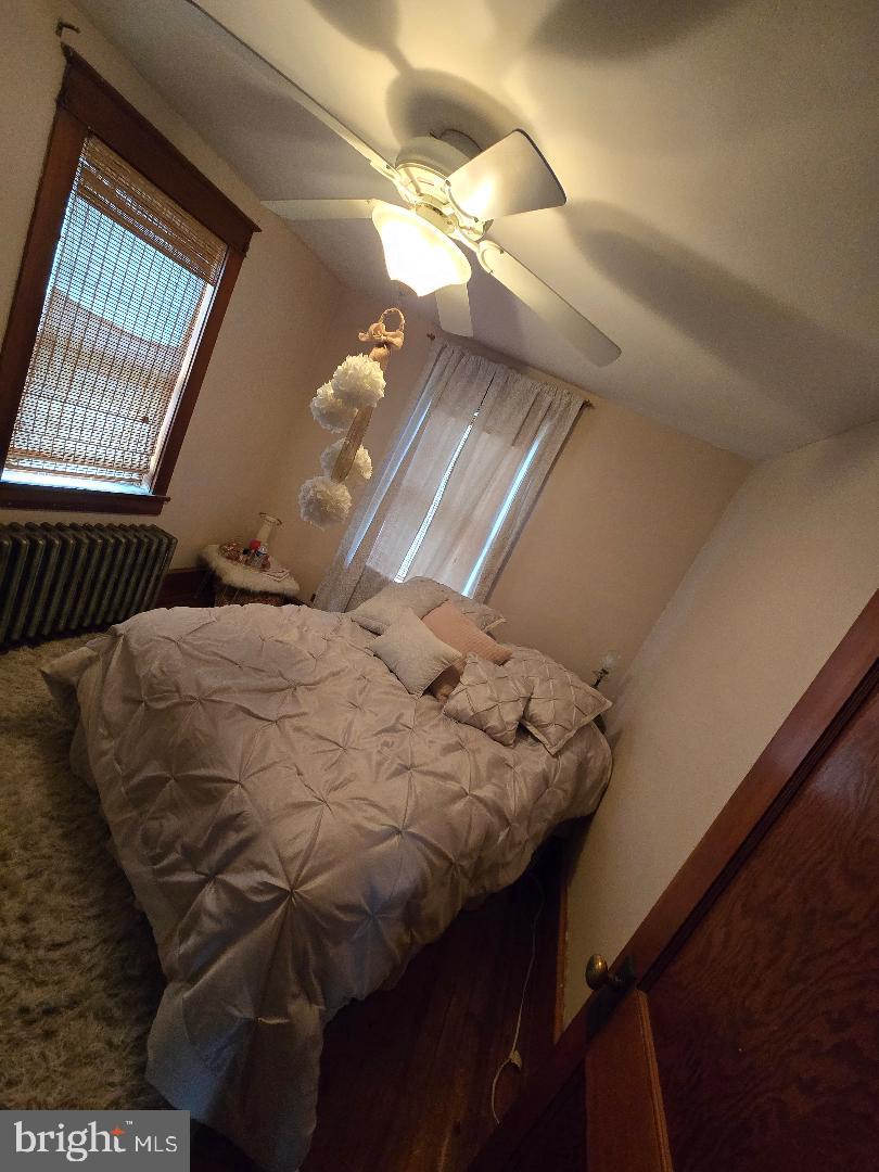 201 South Barbara Street Mount Joy, PA 17552 - Photo 12 of 13 a bed sitting in a bedroom next to a window