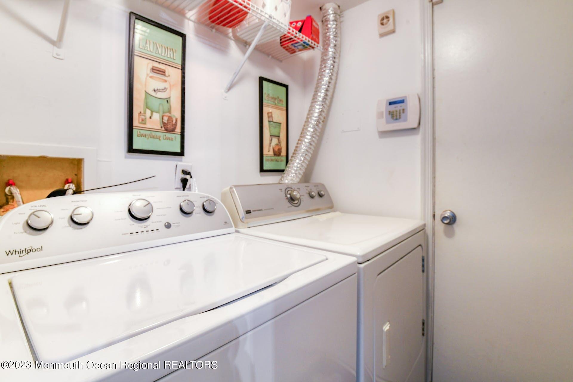 98 Starlight Road Howell, NJ 07731 - Photo 23 of 31 a utility room with dryer and washer