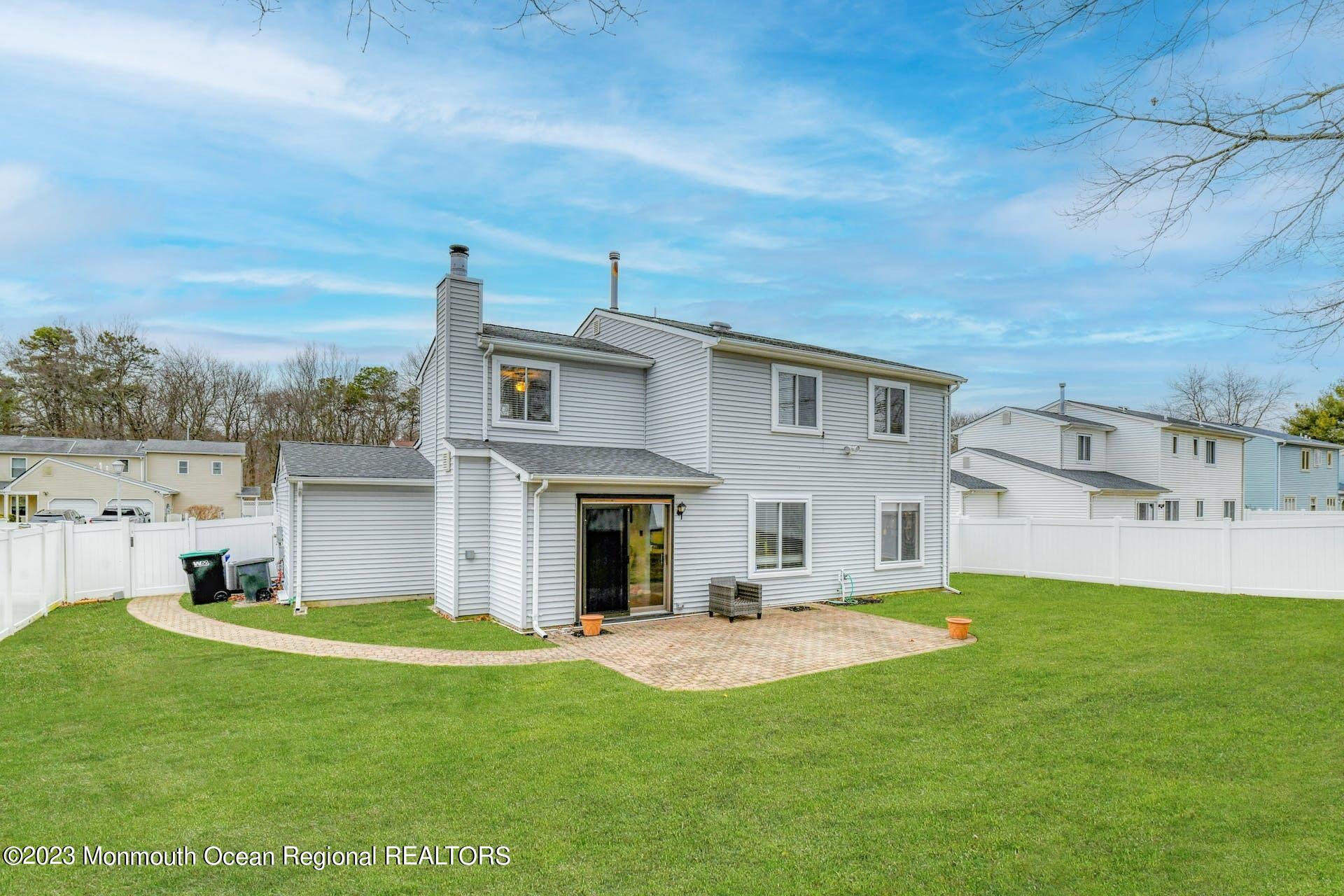 98 Starlight Road Howell, NJ 07731 - Photo 28 of 31 a view of a house with a big yard