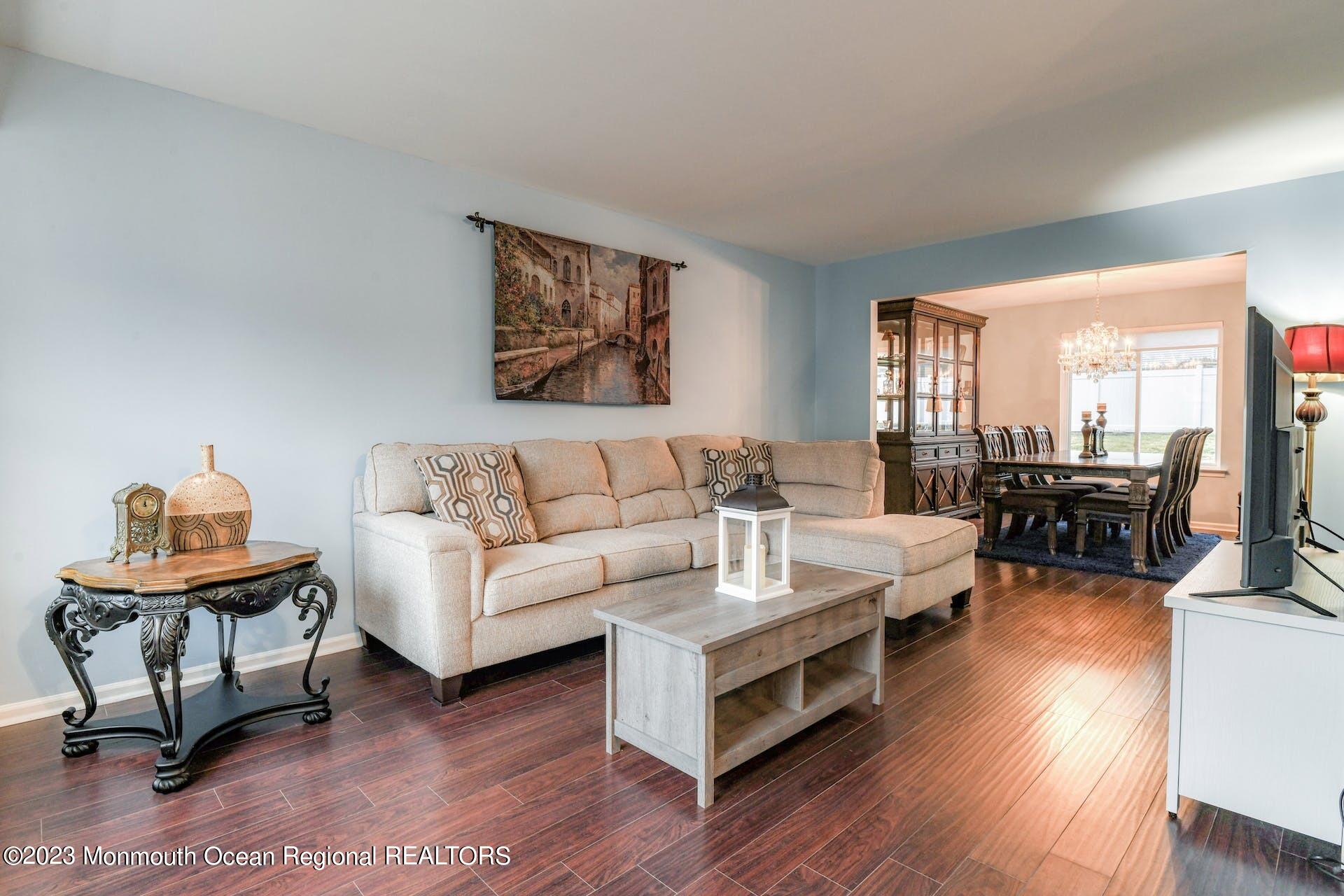 98 Starlight Road Howell, NJ 07731 - Photo 4 of 31 a living room with furniture and a wooden floor