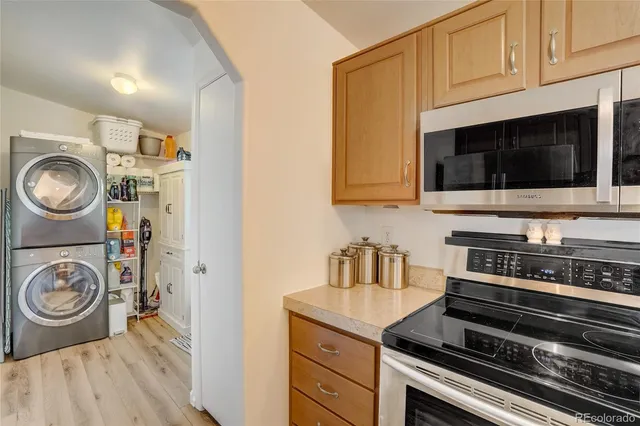 a kitchen with a stove and a microwave