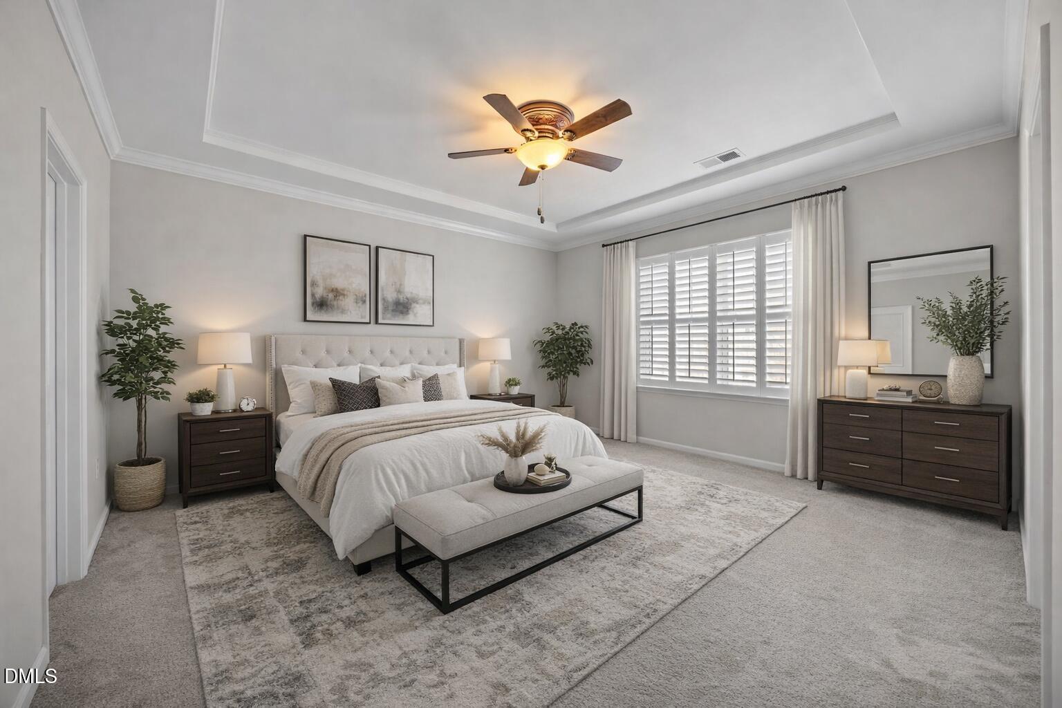 217 Masden Road Holly Springs, NC 27540 - Photo 15 of 32 a spacious bedroom with a bed and a chandelier