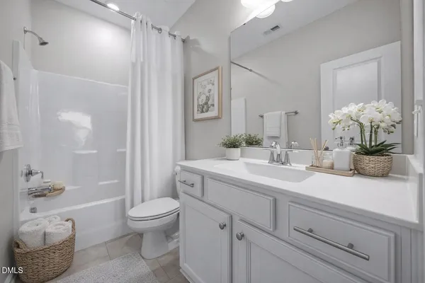 a bed room with a bed and a window