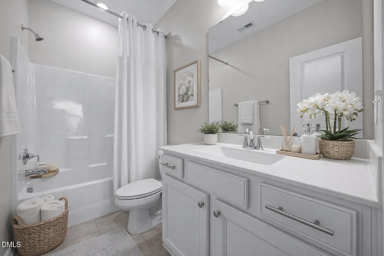 217 Masden Road Holly Springs, NC 27540 - Photo 22 of 32 a bathroom with a double vanity sink toilet and shower