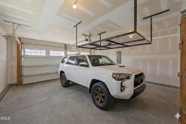 a bathroom with a sink double vanity and a mirror