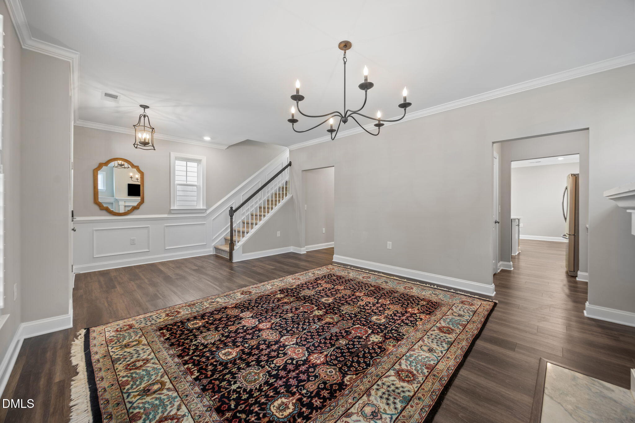 217 Masden Road Holly Springs, NC 27540 - Photo 7 of 32 a view of entryway and hall with wooden floor