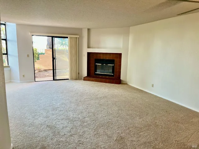 a view of a livingroom from a hallway