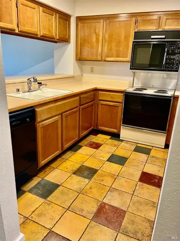 a bathroom with a sink and cabinets