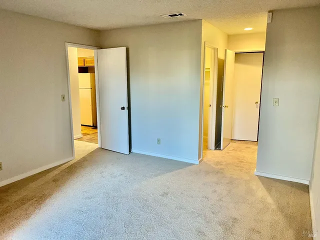 a kitchen with a sink stove and microwave