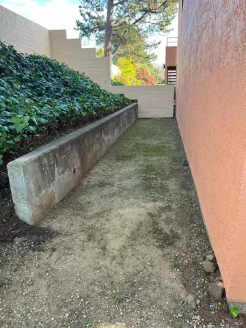 a view of a yard with an outdoor space