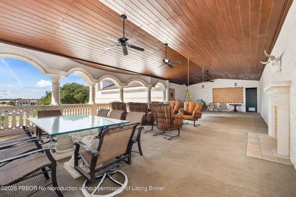 a outdoor space with lots of tables and chairs