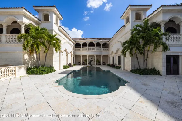 a view of a house with a swimming pool