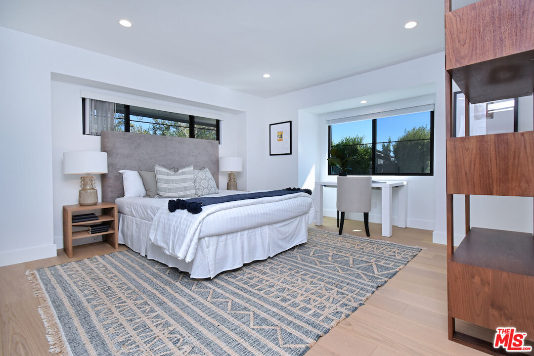 2037 Stradella Road Los Angeles, CA 90077 - Photo 16 of 33 a living room with furniture and a couch