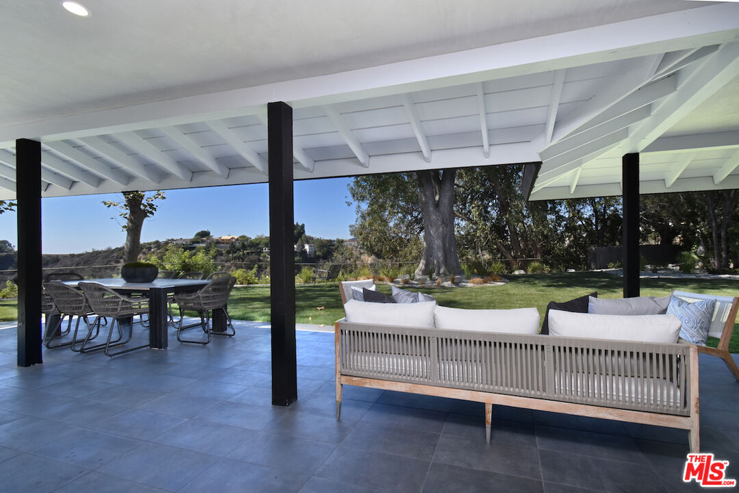 2037 Stradella Road Los Angeles, CA 90077 - Photo 24 of 33 a outdoor space with furniture