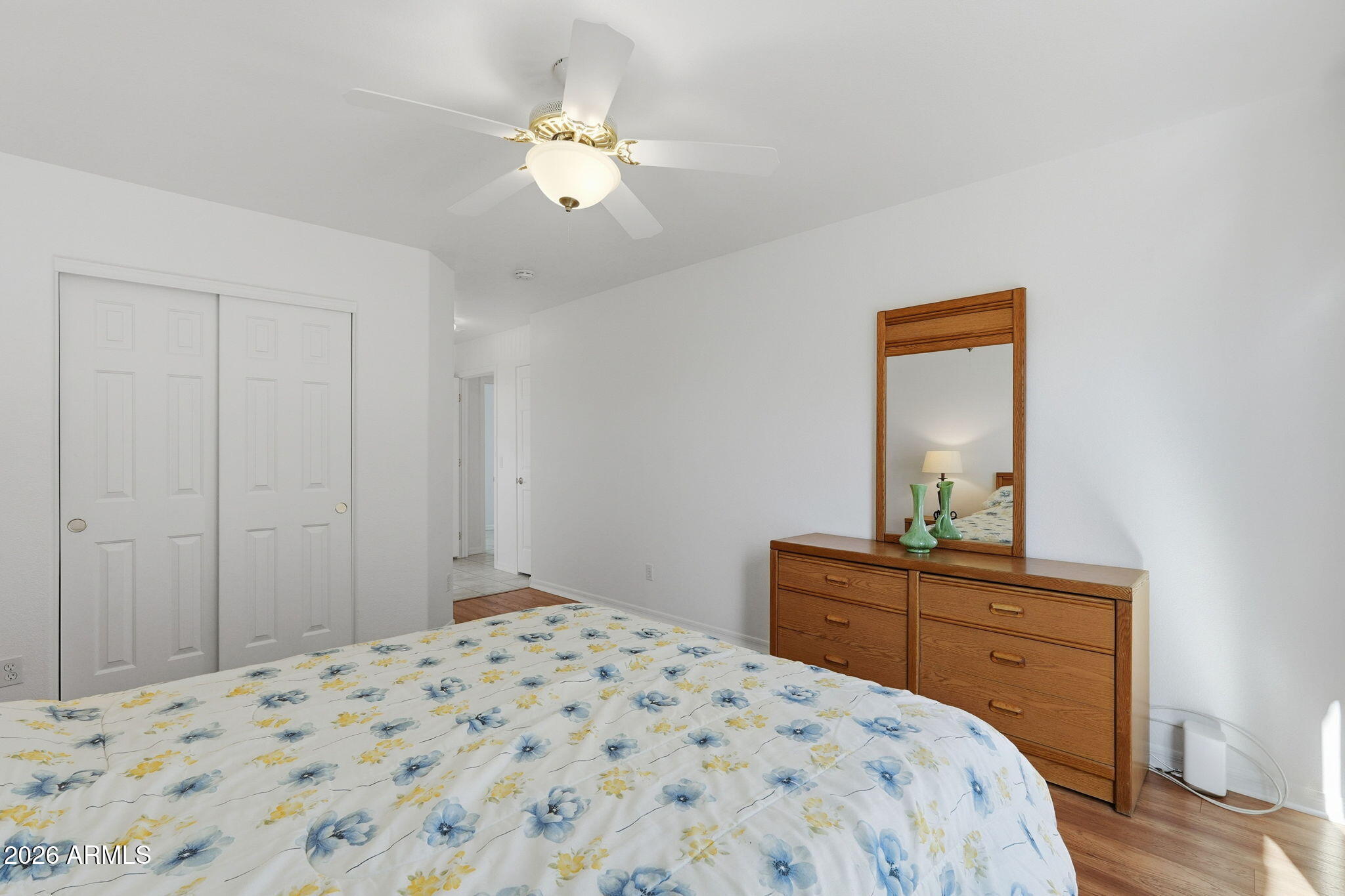 6317 South Pinaleno Place Chandler, AZ 85249 - Photo 17 of 45 a bedroom with a bed and a dresser