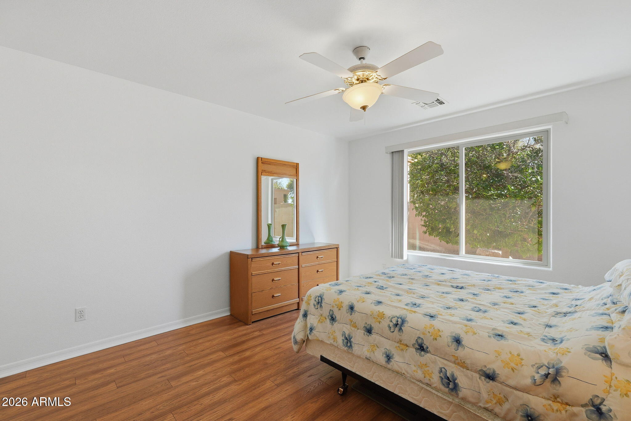 6317 South Pinaleno Place Chandler, AZ 85249 - Photo 18 of 45 a bedroom with a bed and a window