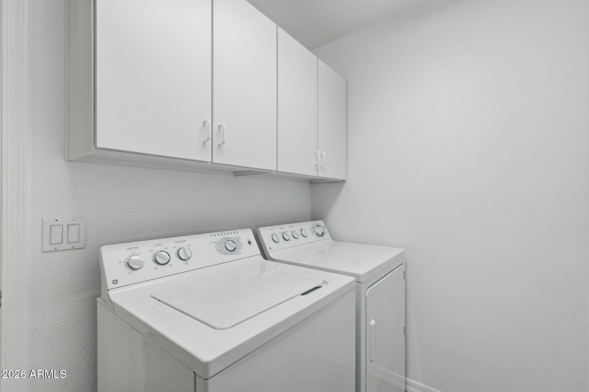 6317 South Pinaleno Place Chandler, AZ 85249 - Photo 29 of 45 a utility room with dryer and washer