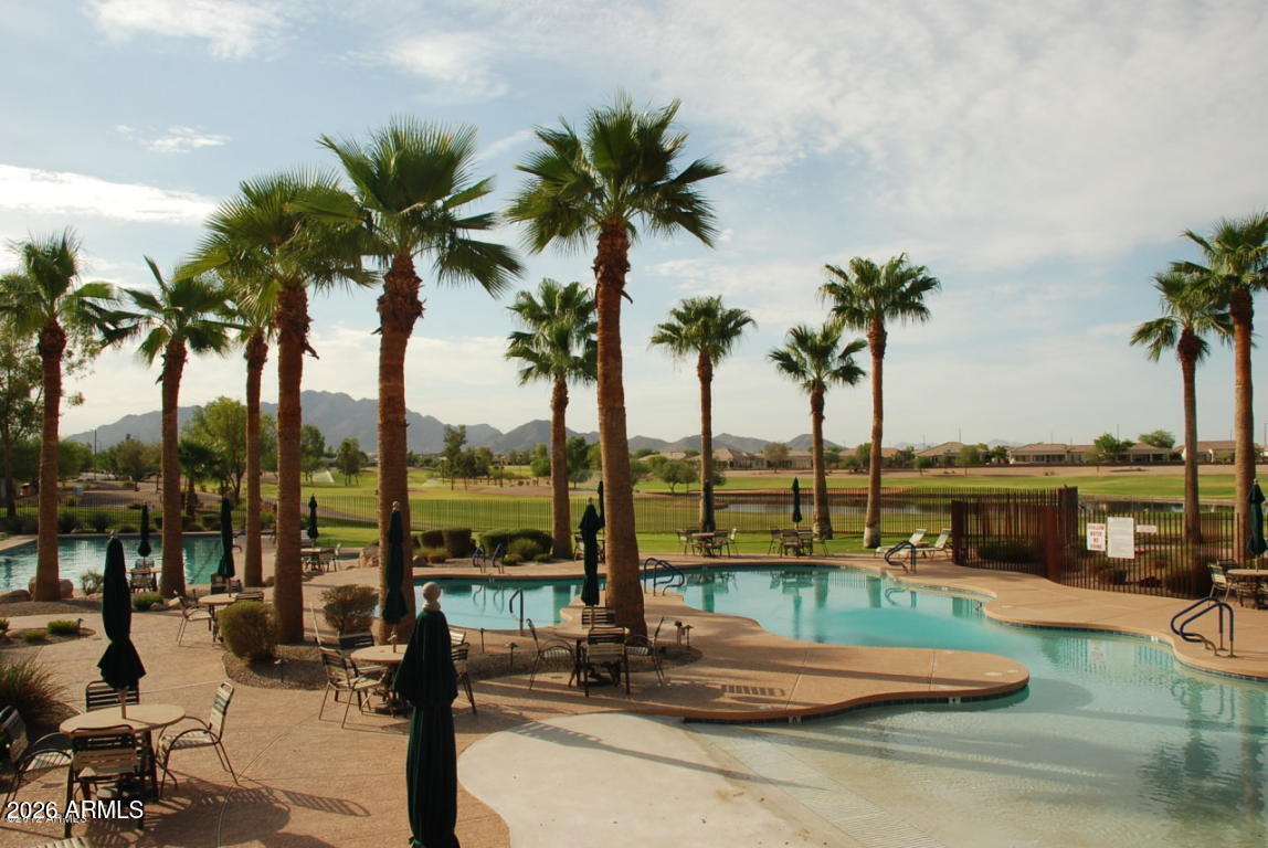 6317 South Pinaleno Place Chandler, AZ 85249 - Photo 38 of 45 a view of a lake with a city view