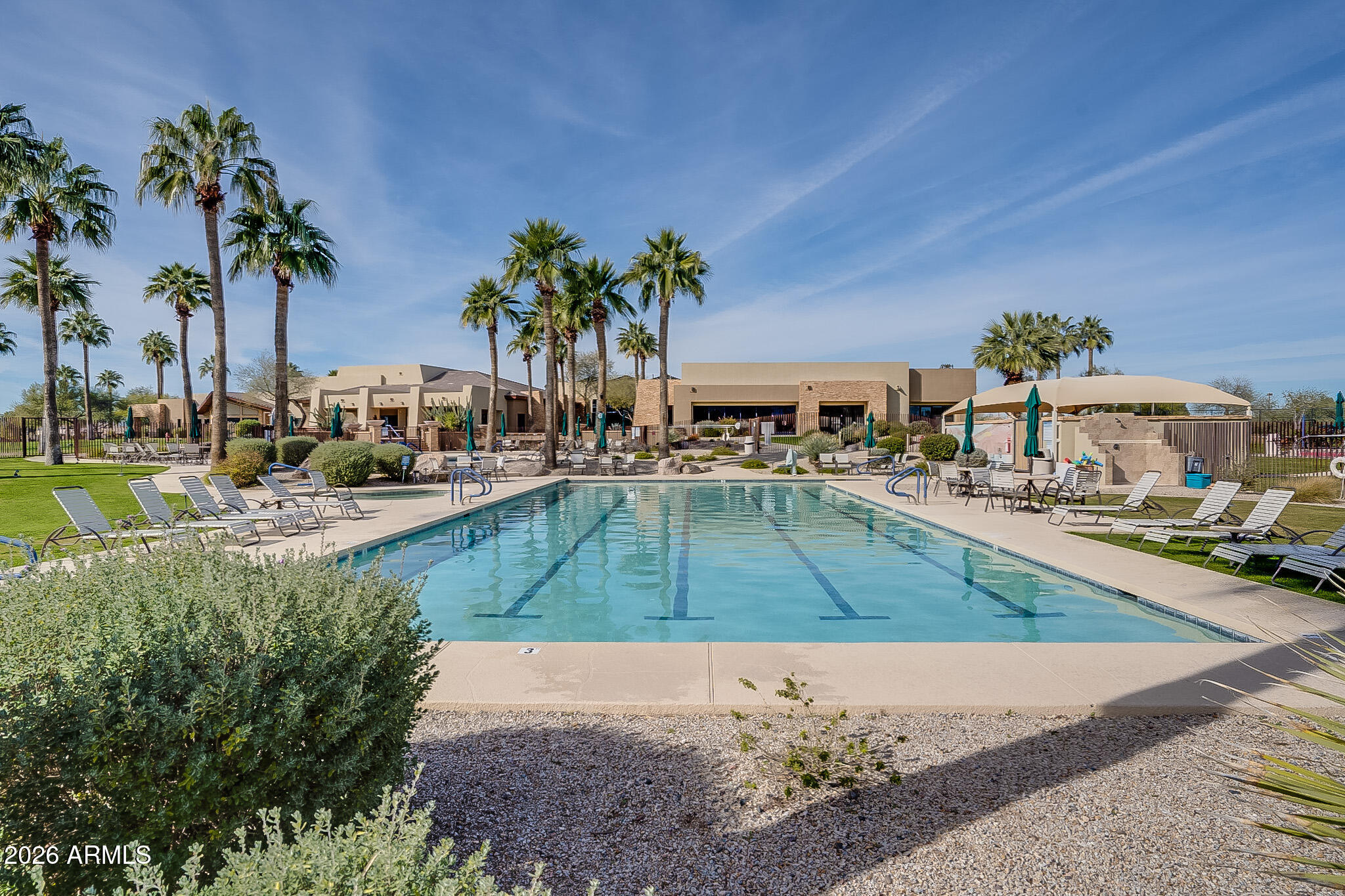 6317 South Pinaleno Place Chandler, AZ 85249 - Photo 39 of 45 a view of a yard with cars park