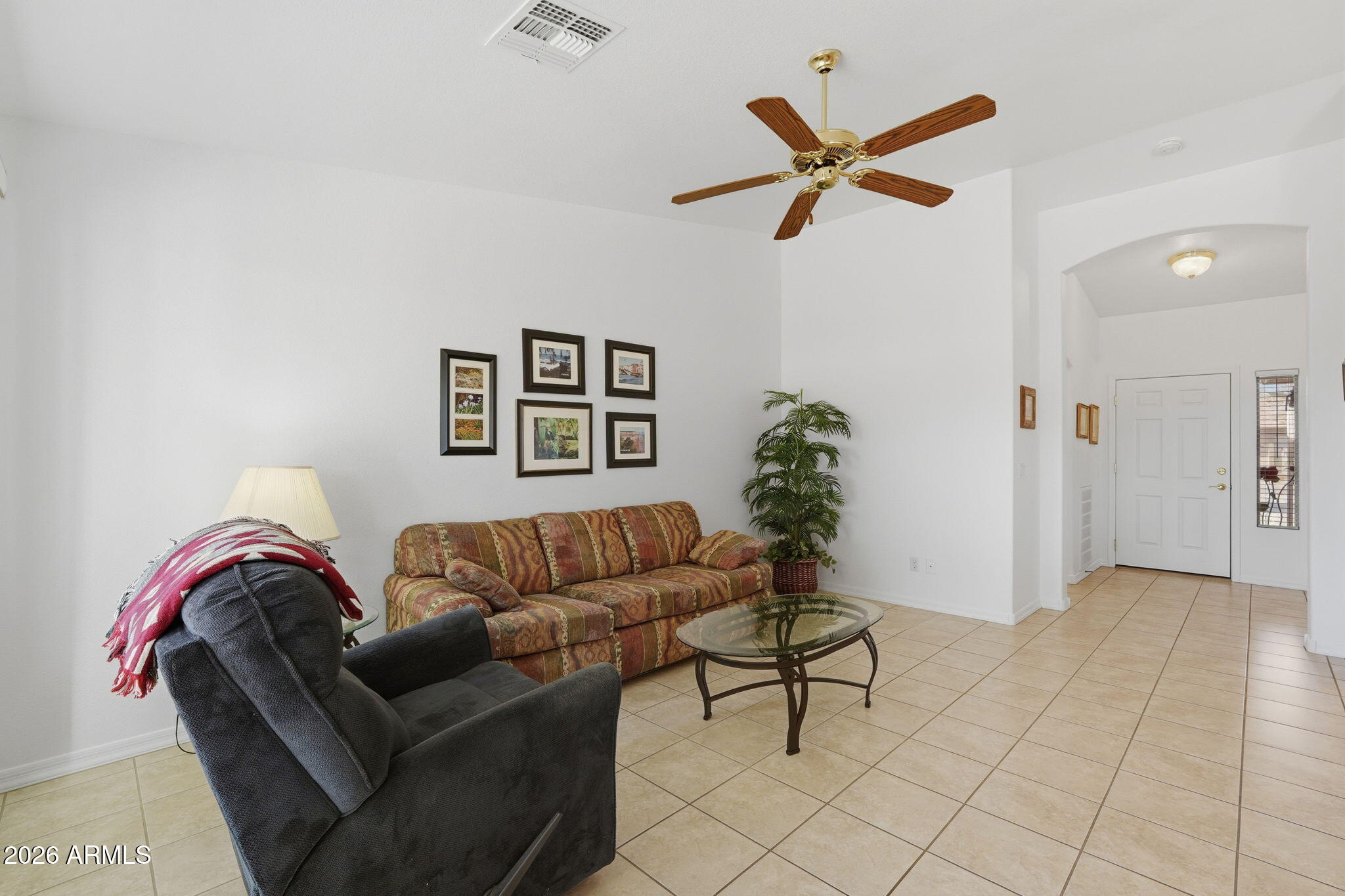 6317 South Pinaleno Place Chandler, AZ 85249 - Photo 5 of 45 a living room with furniture