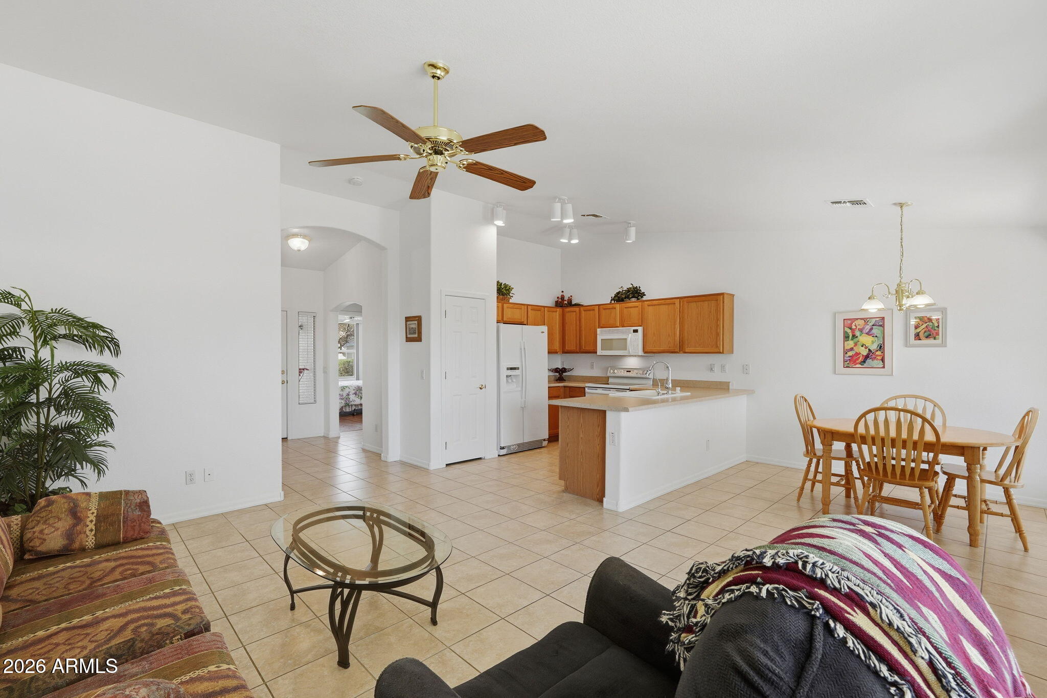 6317 South Pinaleno Place Chandler, AZ 85249 - Photo 6 of 45 a living room with furniture and wooden floor