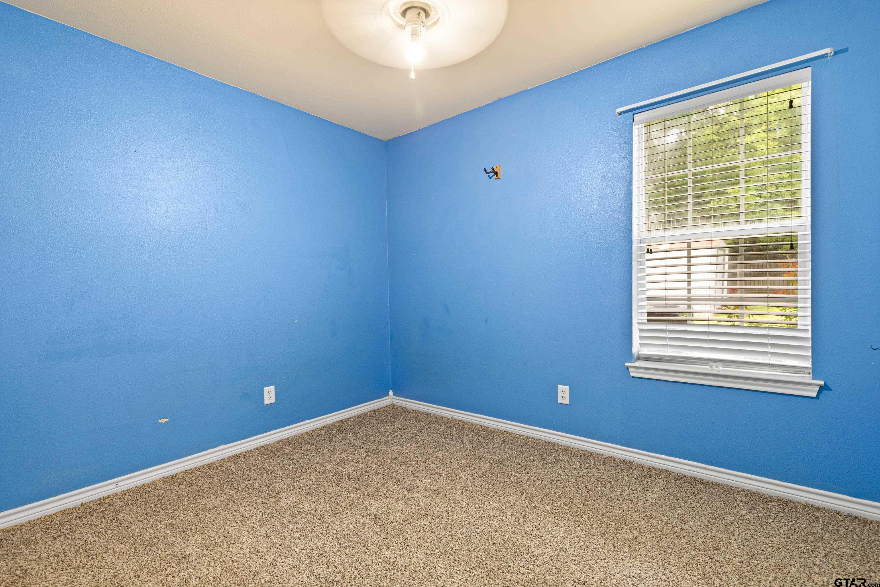 3631 Andrea Street Longview, TX 75604 - Photo 28 of 44 an empty room with a window