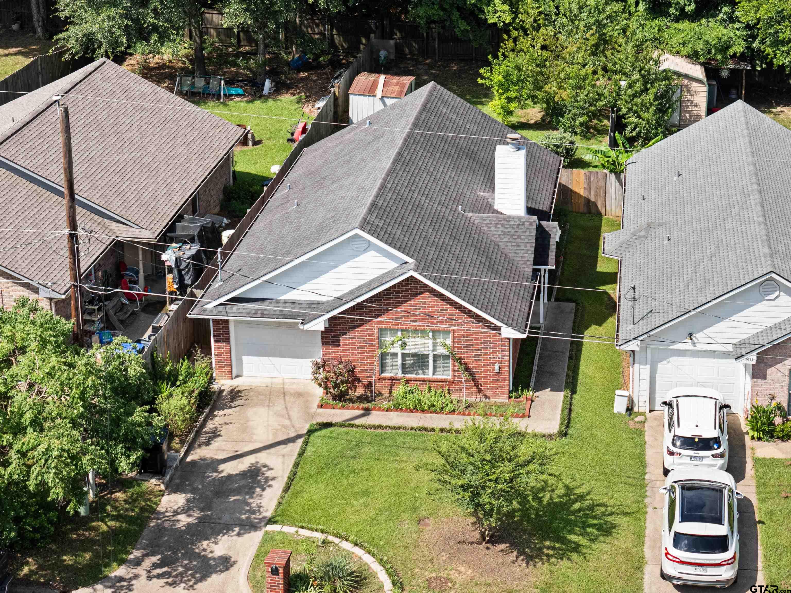 3631 Andrea Street Longview, TX 75604 - Photo 40 of 44 a aerial view of a house with a yard