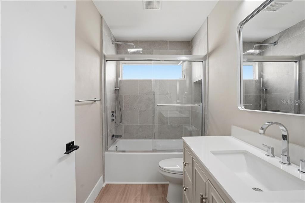 1723 Elk Spring Drive Brandon, FL 33511 - Photo 15 of 21 a bathroom with a sink toilet and shower