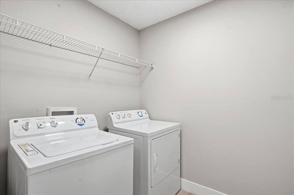 1723 Elk Spring Drive Brandon, FL 33511 - Photo 17 of 21 a utility room with dryer and washer