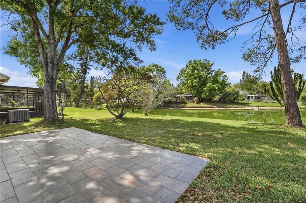 1723 Elk Spring Drive Brandon, FL 33511 - Photo 19 of 21 a view of a garden with a tree