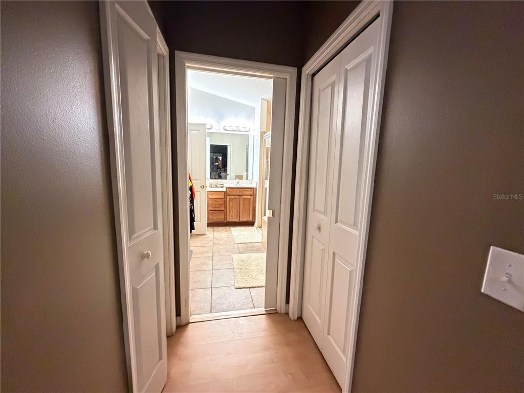 945 Tramells Trail Kissimmee, FL 34744 - Photo 23 of 36 a view of a bathroom from the hallway