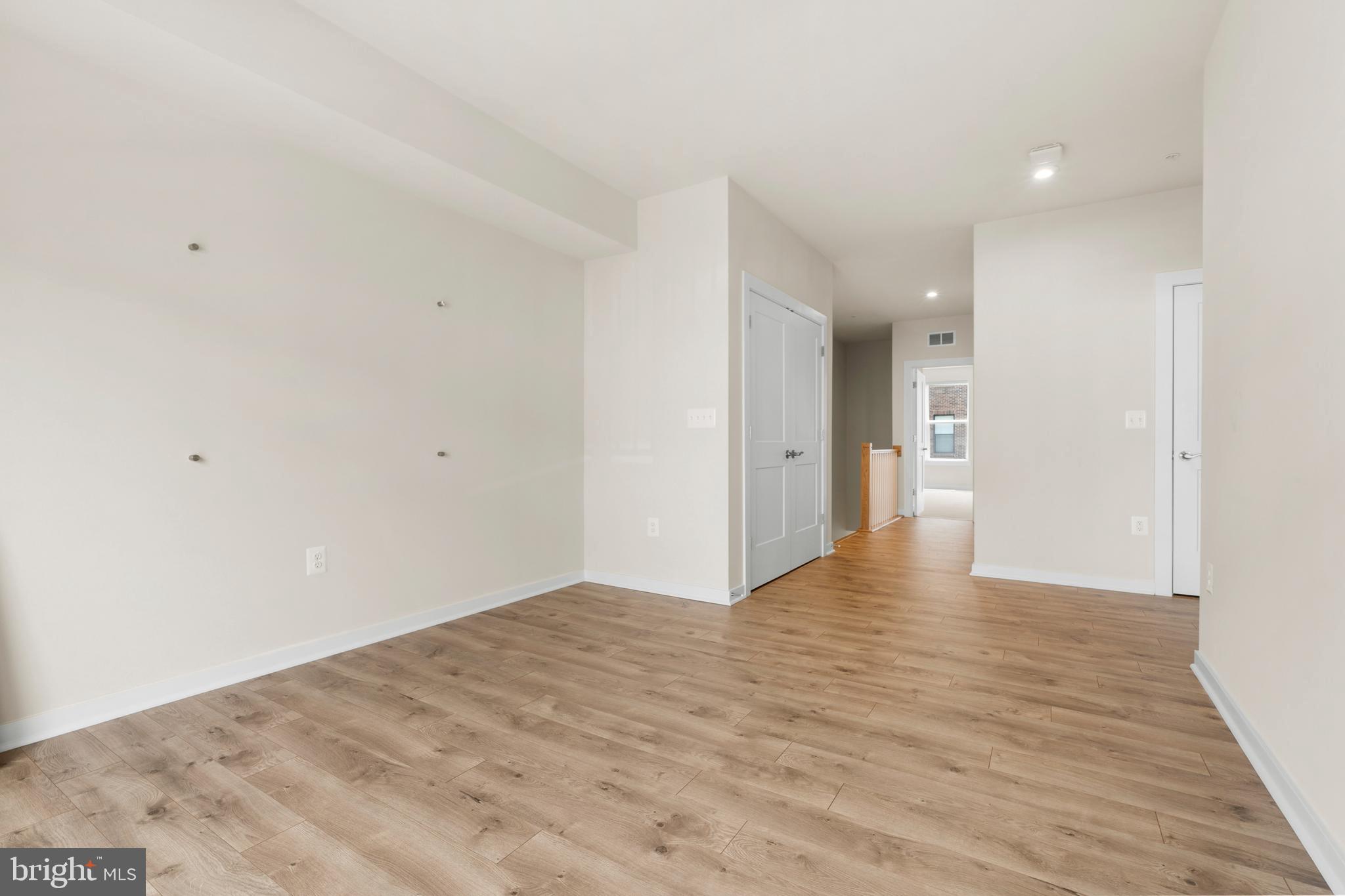 44487 Wolfhound Square Ashburn, VA 20147 - Photo 28 of 39 a view of an empty room with wooden floor