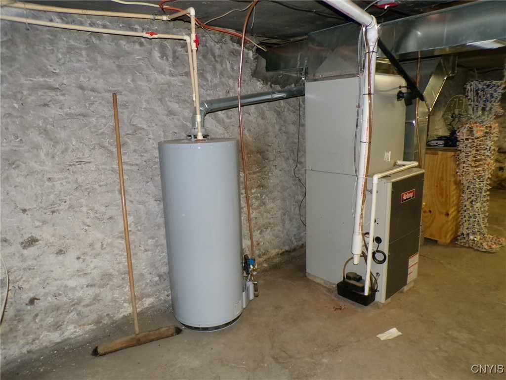 7180 Glur Road Rome, NY 13440 - Photo 43 of 49 one story side water heater and propane furnace with central air conditionioning