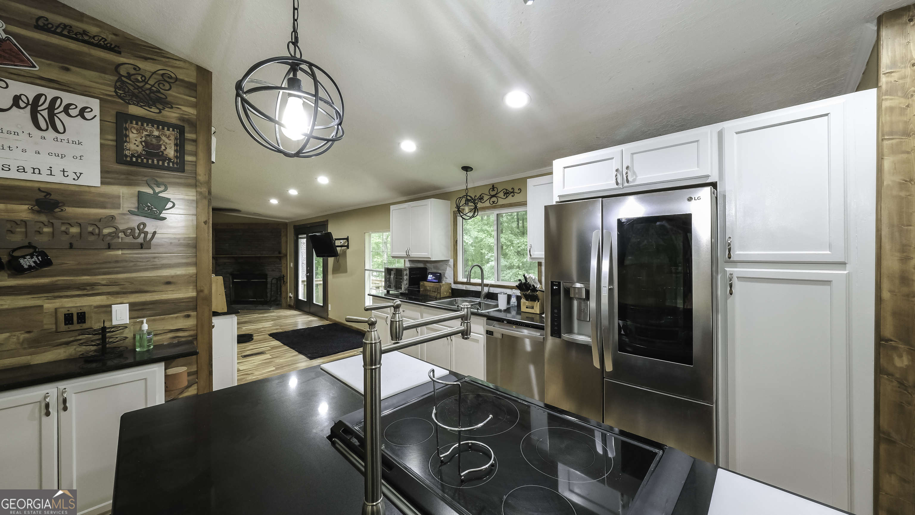 91 Holder Road Temple, GA 30179 - Photo 11 of 40 a kitchen with stainless steel appliances granite countertop a refrigerator and a stove top oven