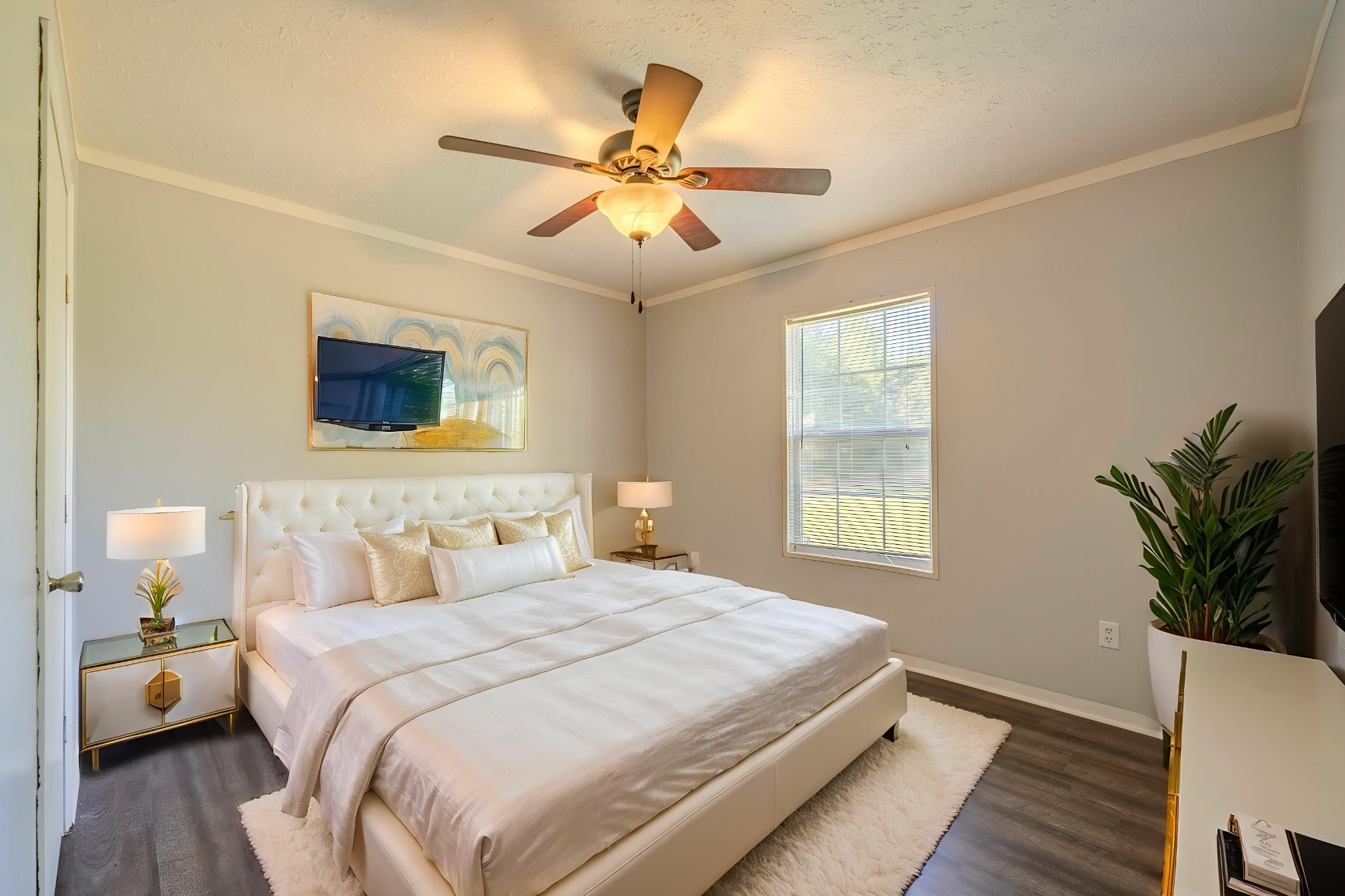 1125 Clifft Road Bolivar, TN 38008 - Photo 44 of 78 a bedroom with a bed and a chandelier