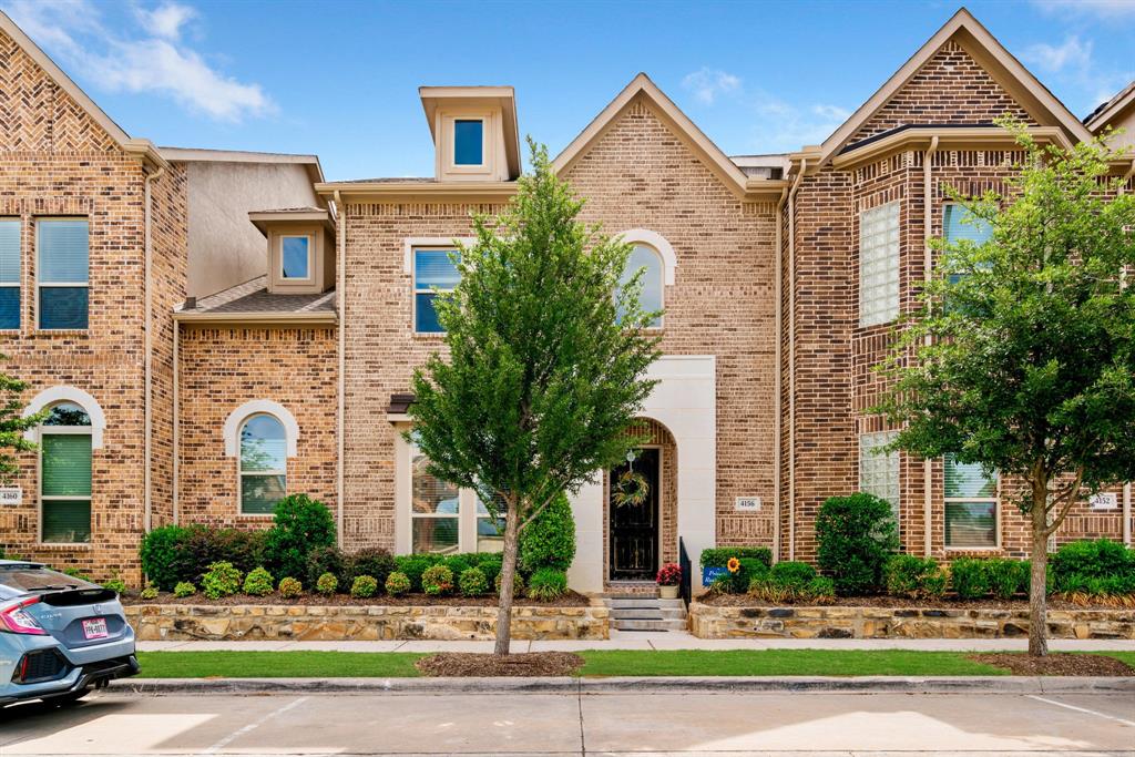4156 Riverside Drive Flower Mound, TX 75028 - Photo 1 of 1 a front view of a house with a yard