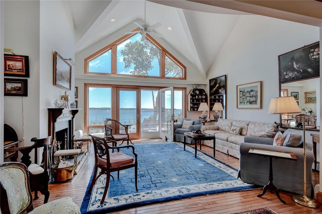 536 Reach Road Deer Isle, ME 04627 - Photo 8 of 33 Living room with fireplace, french...