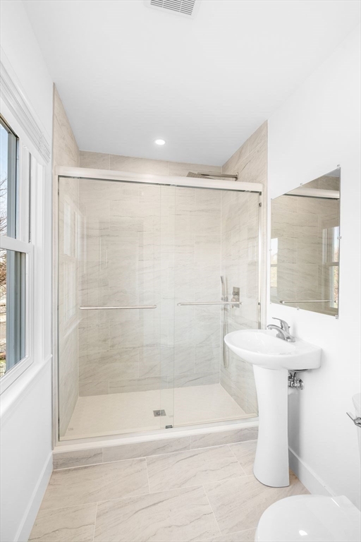 90 Puritan Road Swampscott, MA 01907 - Photo 32 of 42 a bathroom with a sink toilet and shower