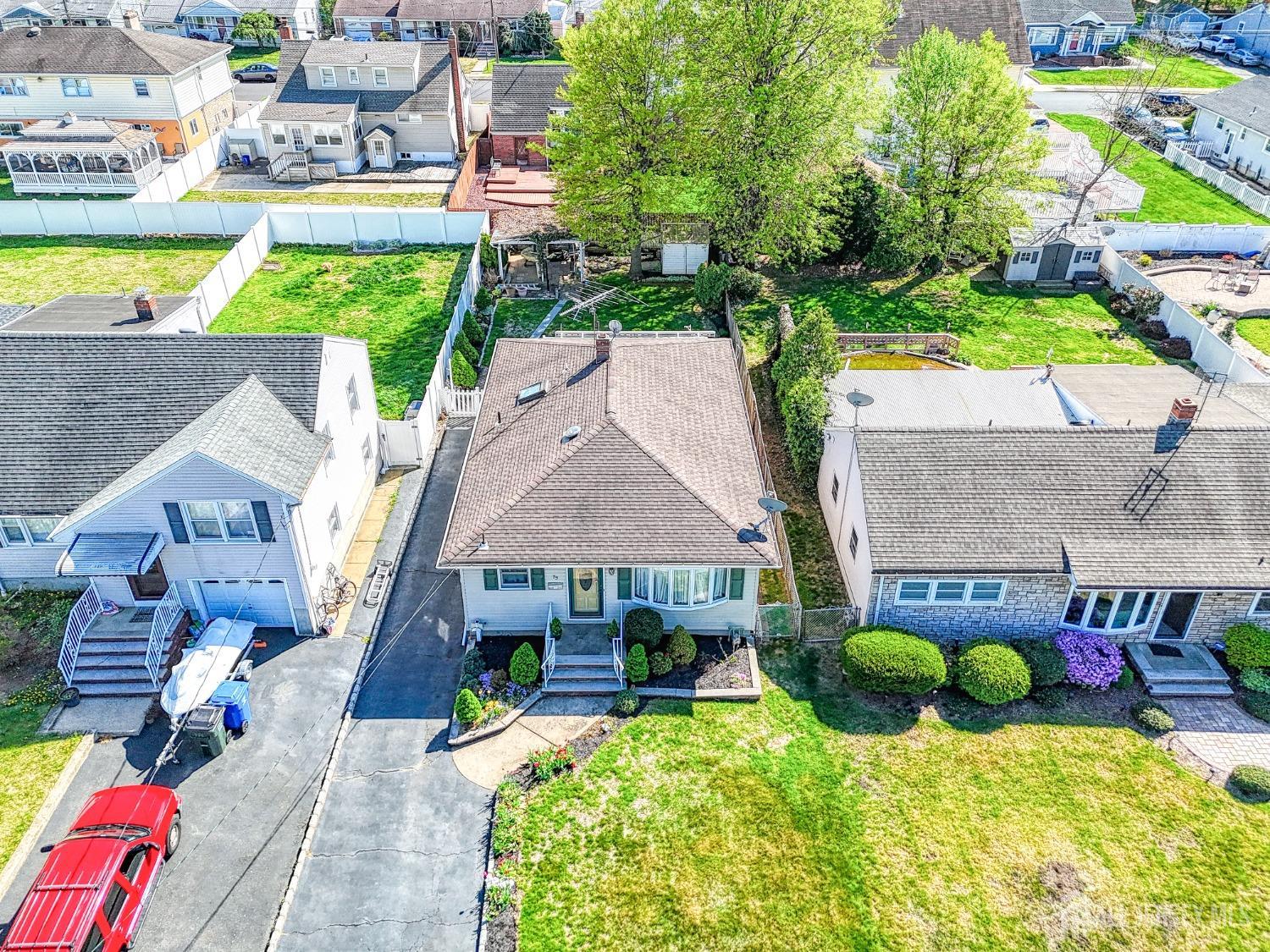 79 South Hill Road Colonia, NJ 07067 - Photo 3 of 34 an aerial view of a house with swimming pool and patio