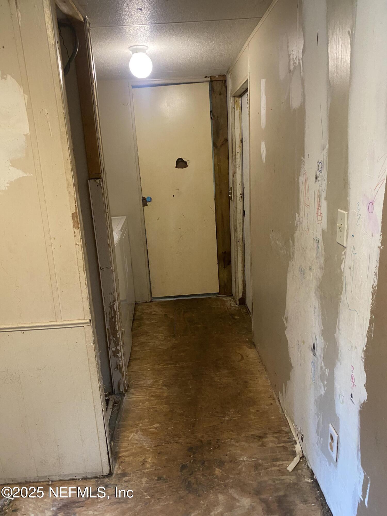 10017 Factory Avenue Hampton, FL 32044 - Photo 5 of 11 a view of a bathroom with a glass door shower