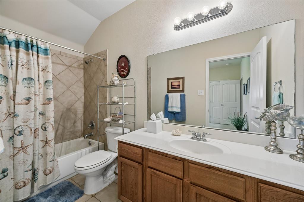 2003 Downing Street Allen, TX 75013 - Photo 28 of 40 This striking ensuite bath has lots of needed counter space and attractive bath/shower!