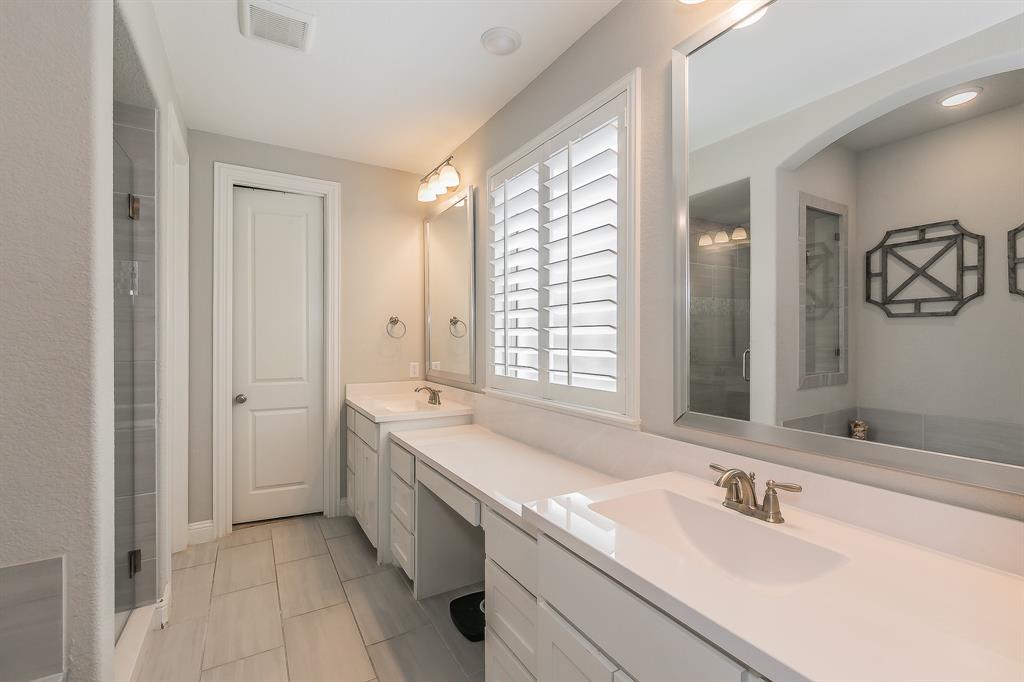 1908 Grey Bark Street Fort Worth, TX 76008 - Photo 15 of 31 Full bathroom with double vanity and a shower with door