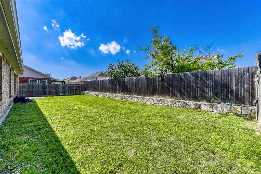 2617 Hereford Road Denton, TX 76210 - Photo 27 of 27 a view of a backyard