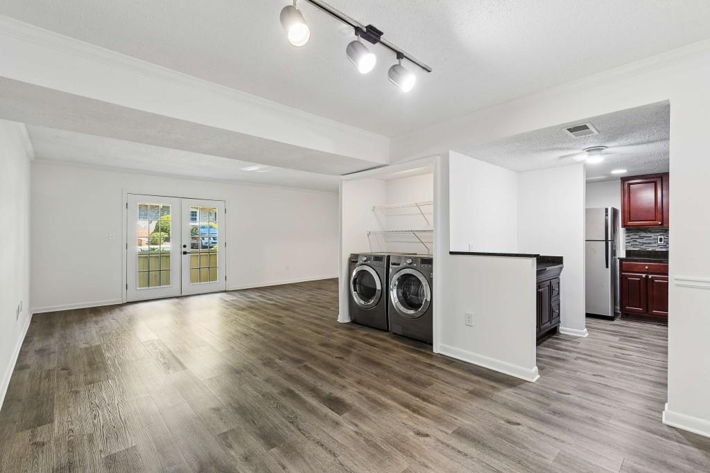 6900 Roswell Road, Unit Q6 Atlanta, GA 30328 - Photo 20 of 38 a view of a storage & utility room with washer and dryer