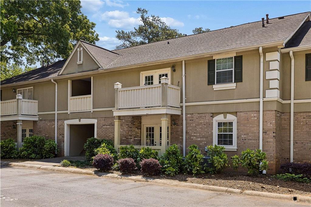 6900 Roswell Road, Unit Q6 Atlanta, GA 30328 - Photo 2 of 38 front view of a house
