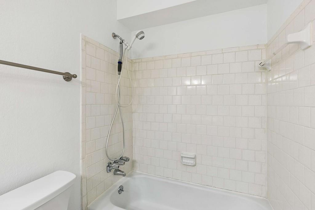 6900 Roswell Road, Unit Q6 Atlanta, GA 30328 - Photo 25 of 38 a bathroom with a shower and a toilet