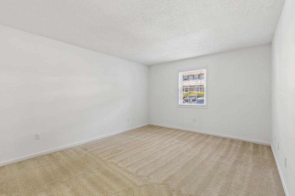 6900 Roswell Road, Unit Q6 Atlanta, GA 30328 - Photo 26 of 38 an empty room with a window