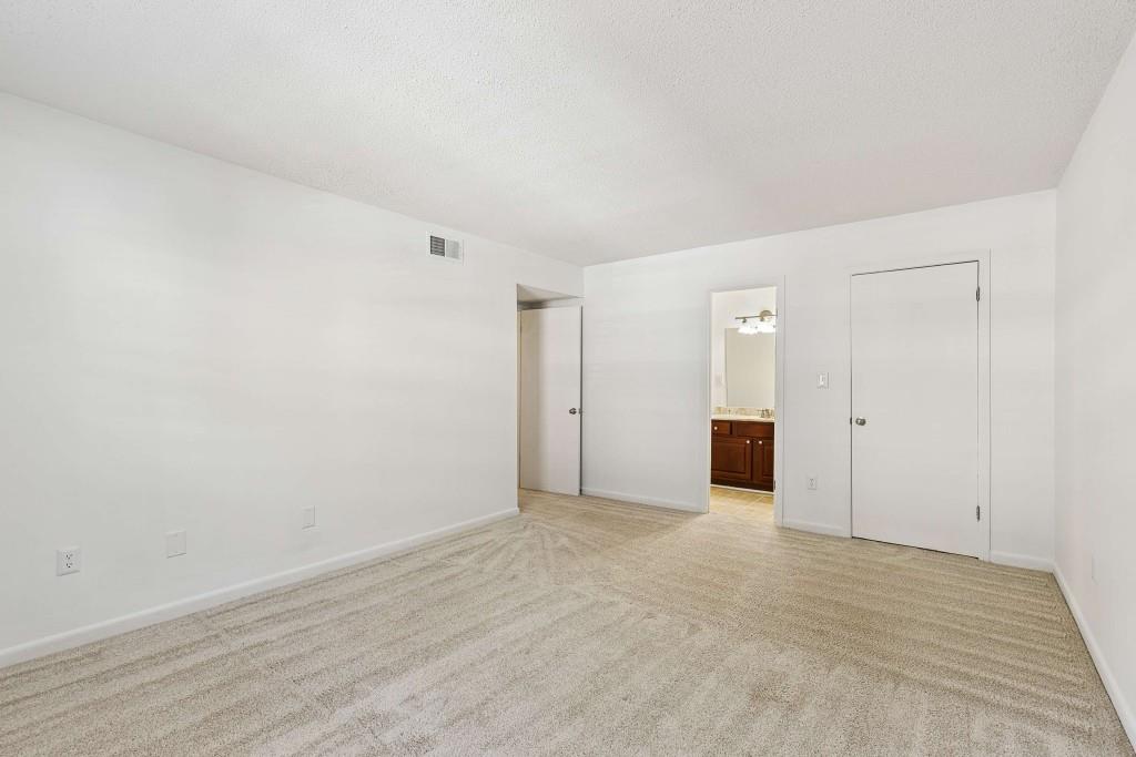 6900 Roswell Road, Unit Q6 Atlanta, GA 30328 - Photo 27 of 38 a view of an empty room